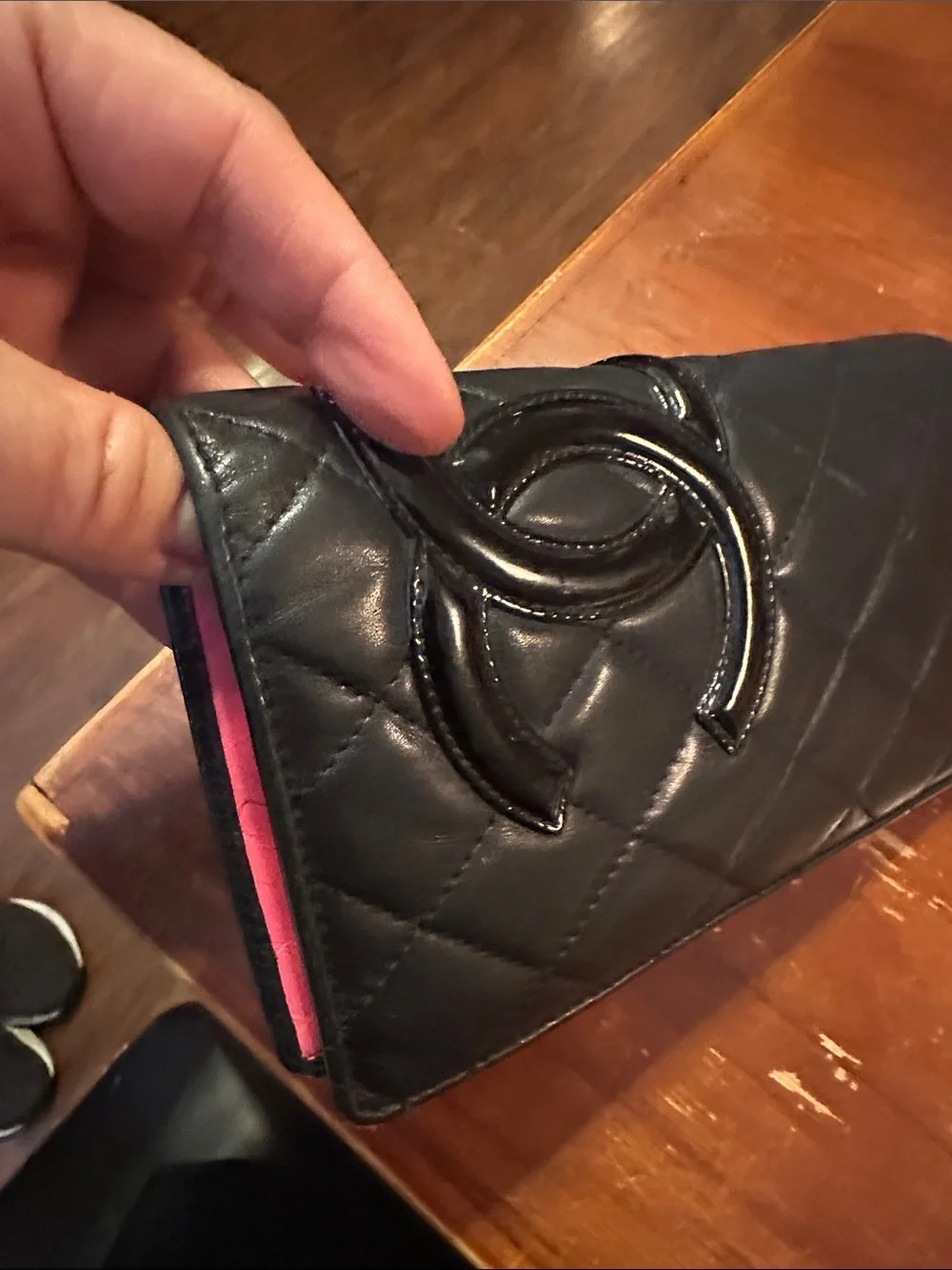CHANEL Black Quilted Leather Wallet with Pink Interior Trim